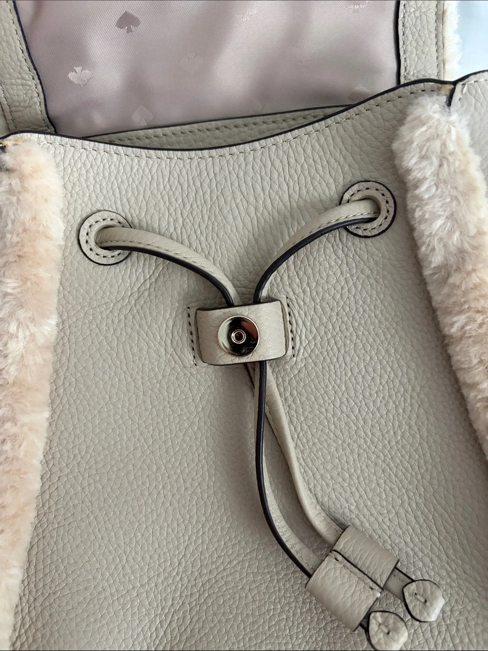 kate spade beige faux-shearling flap backpack